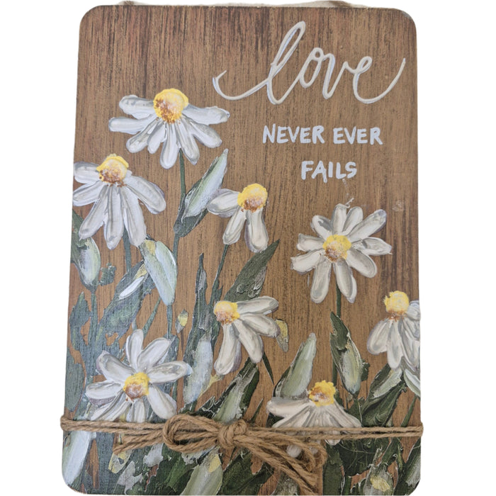 Wall Plaque "Love Never Fails"