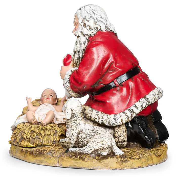 Kneeling Santa by the Manger Scene