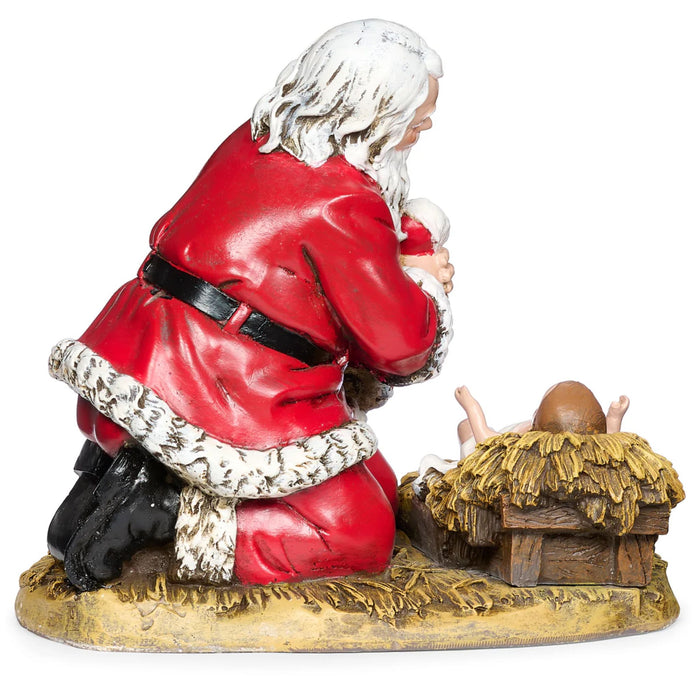 Kneeling Santa by the Manger Scene