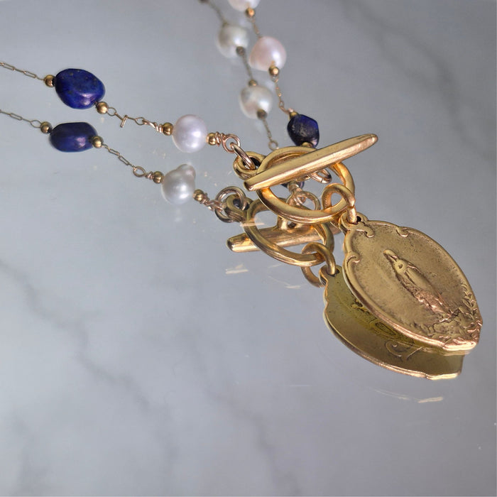 Awesome Wonder Unique Mary Necklace in White and Navy